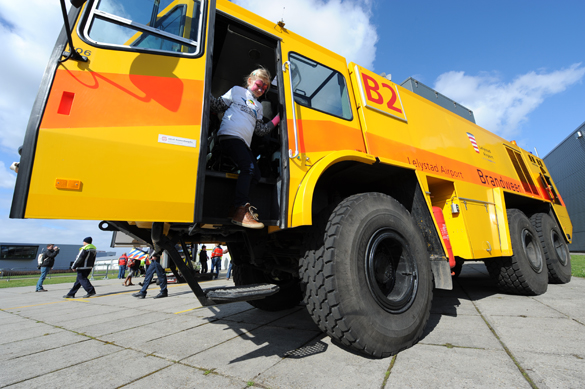 Exploring one of the fire trucks that escorted the children to Lelystad Airport